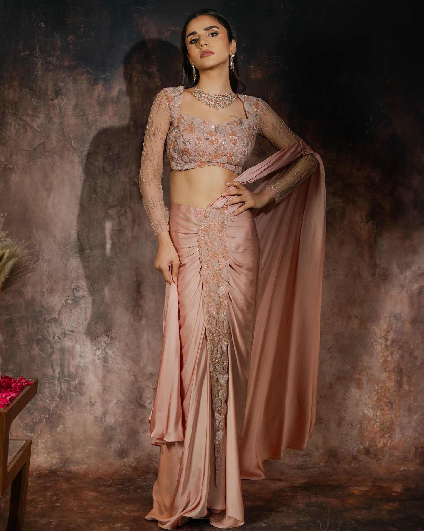 Rosè pre-draped saree with embellished blouse and skirt