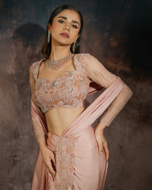 Rosè pre-draped saree with embellished blouse and skirt