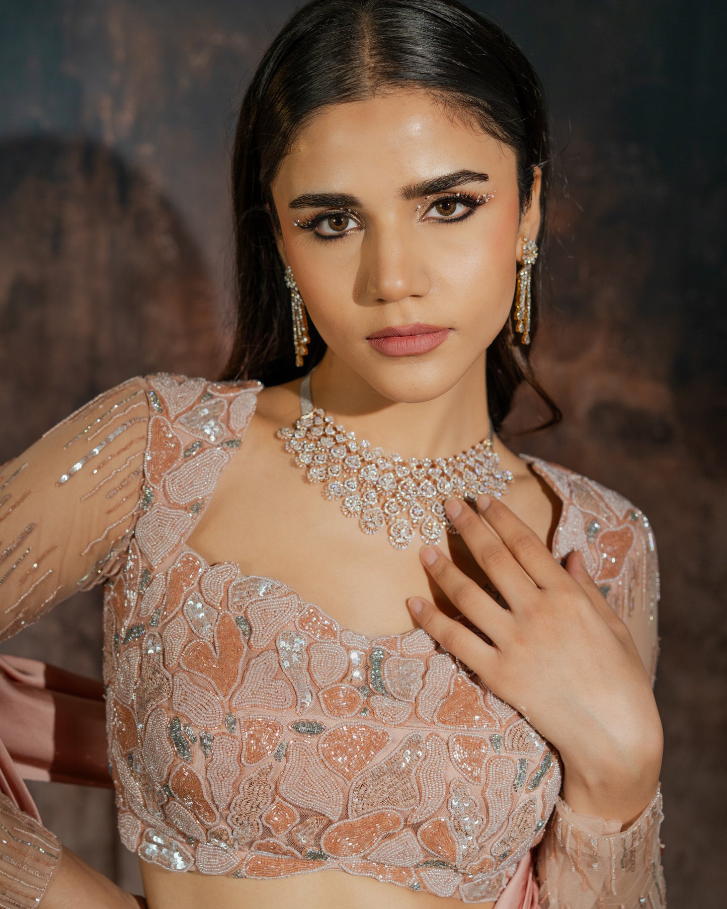 Rosè pre-draped saree with embellished blouse and skirt