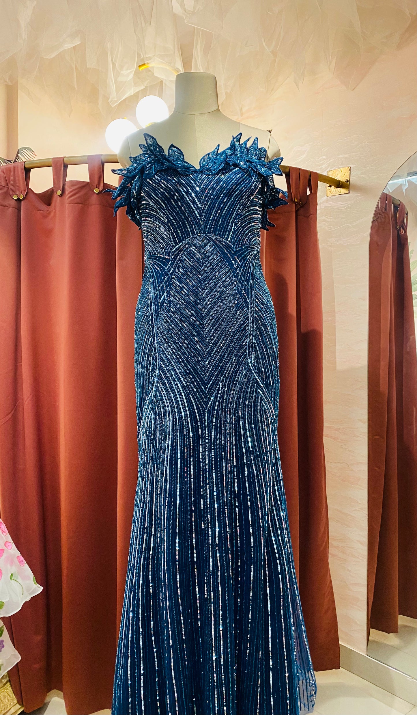 Teal blue trail gown
