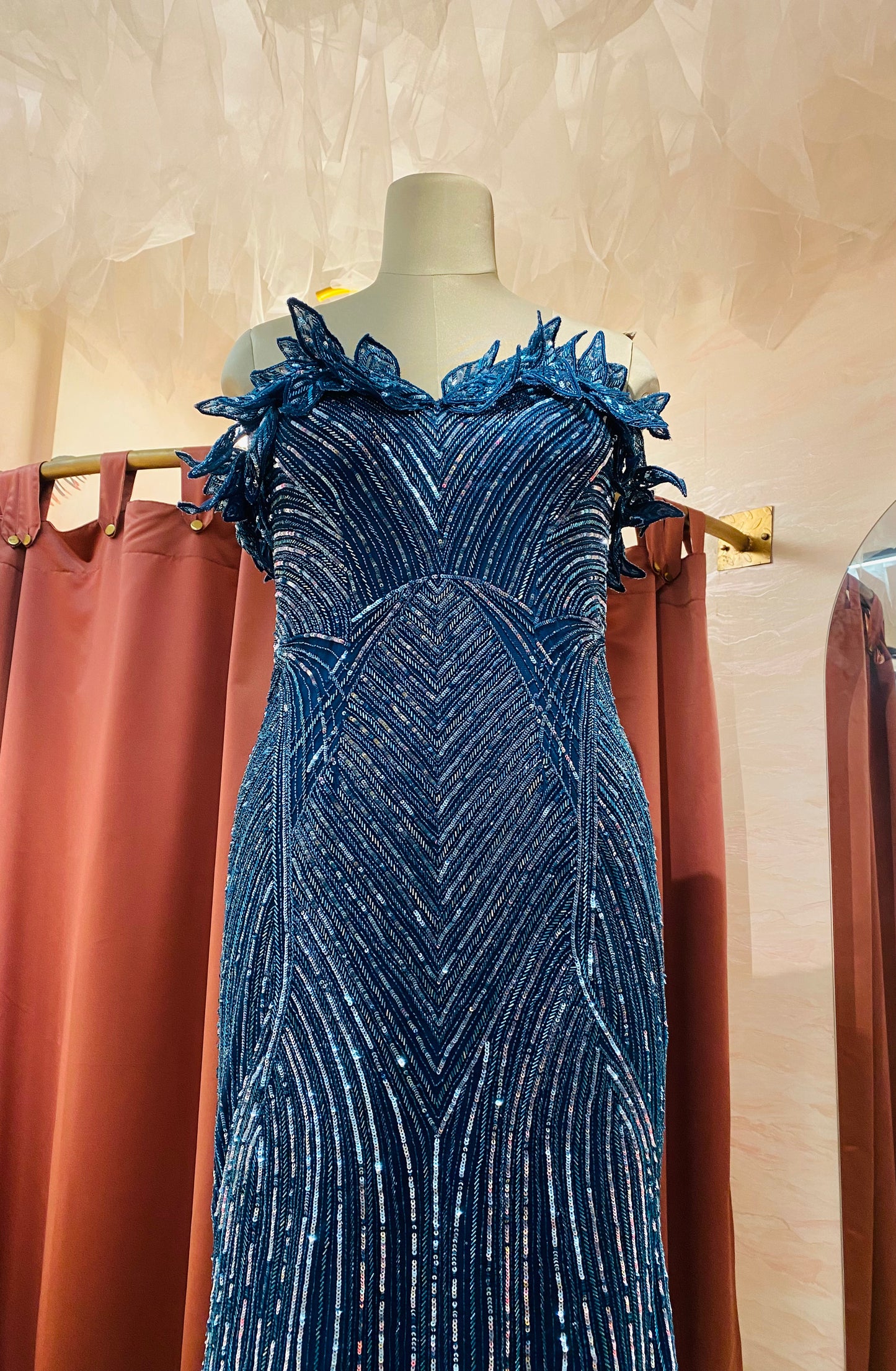 Teal blue trail gown