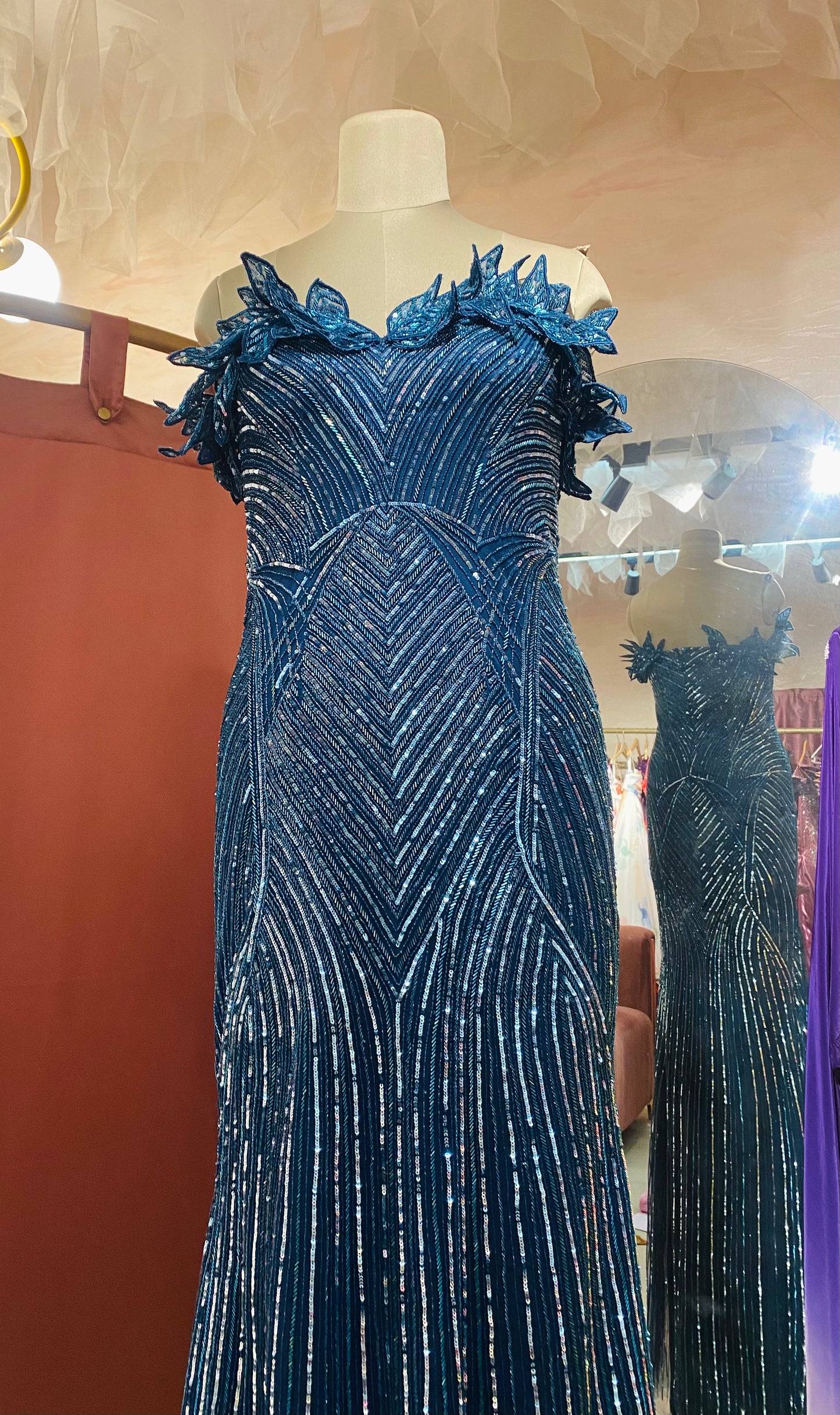 Teal blue trail gown