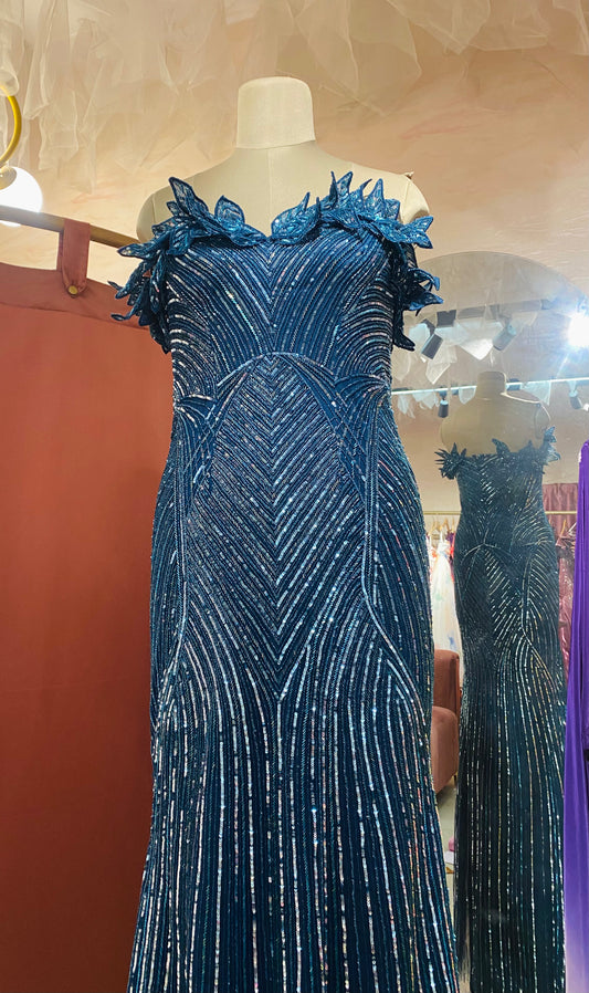 Teal blue trail gown