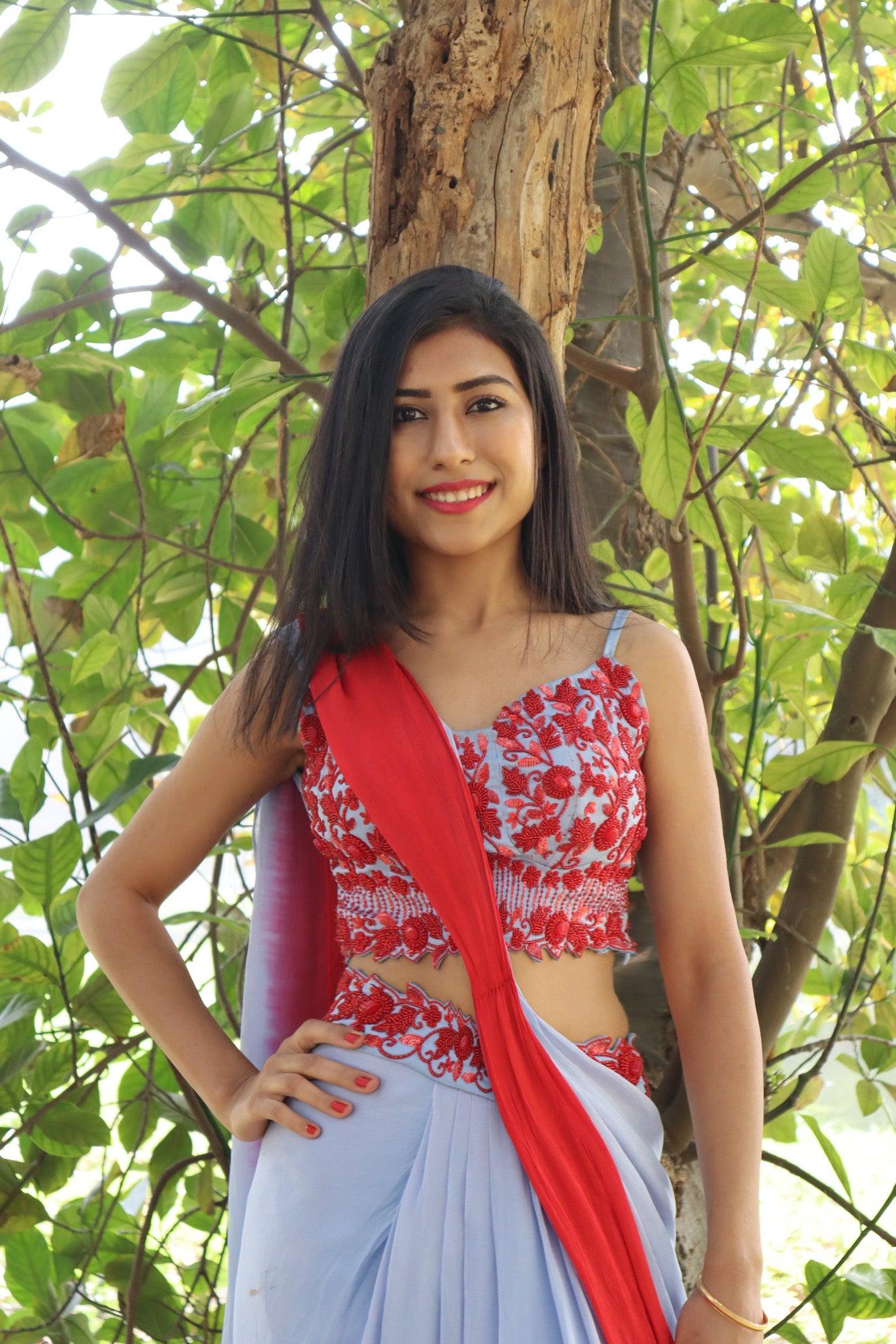 Powder blue and red draped saree skirt with blouse - Nishi Madaan Label