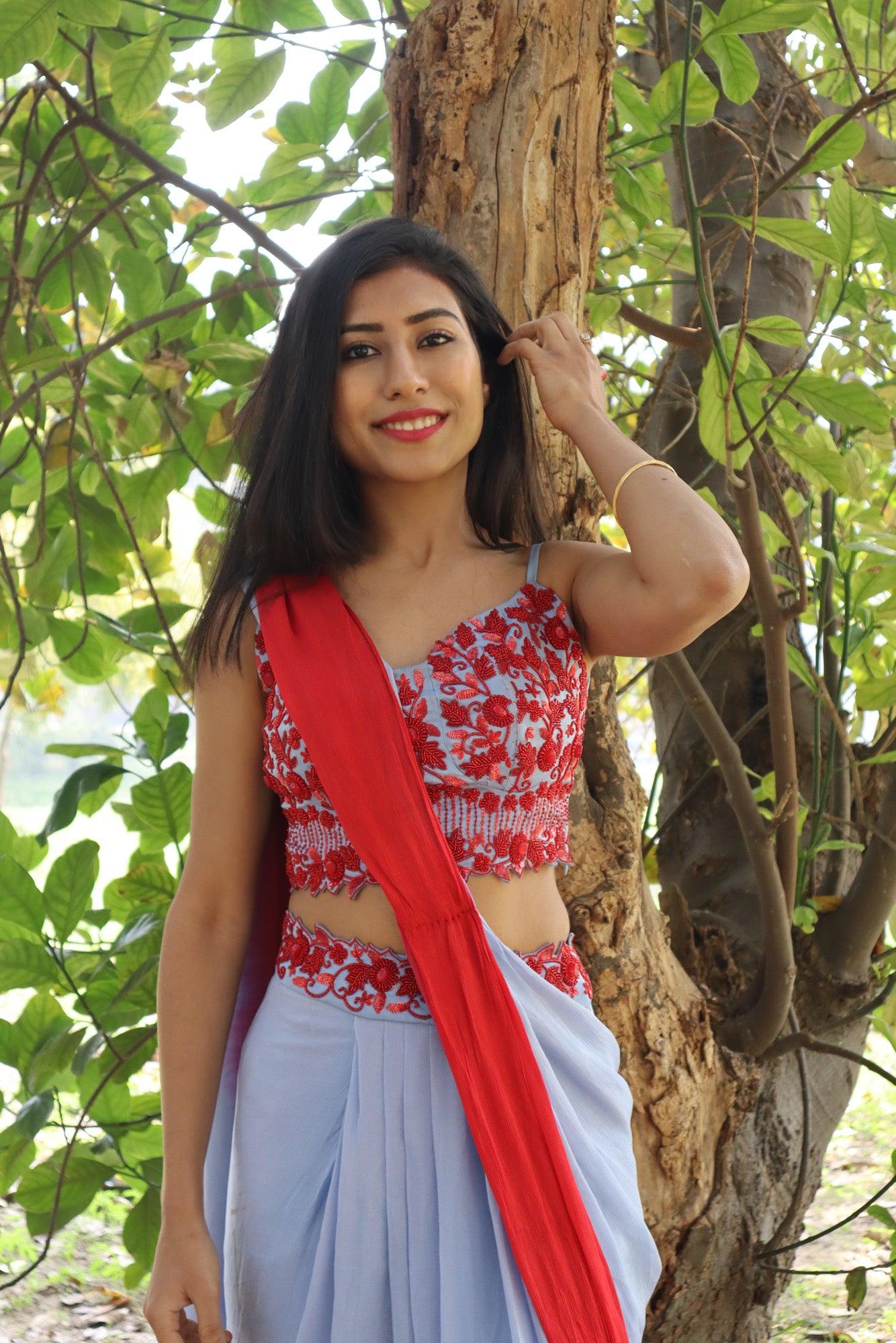 Powder blue and red draped saree skirt with blouse - Nishi Madaan Label