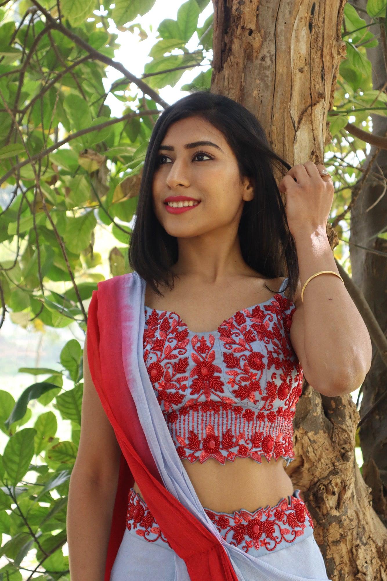Powder blue and red draped saree skirt with blouse - Nishi Madaan Label
