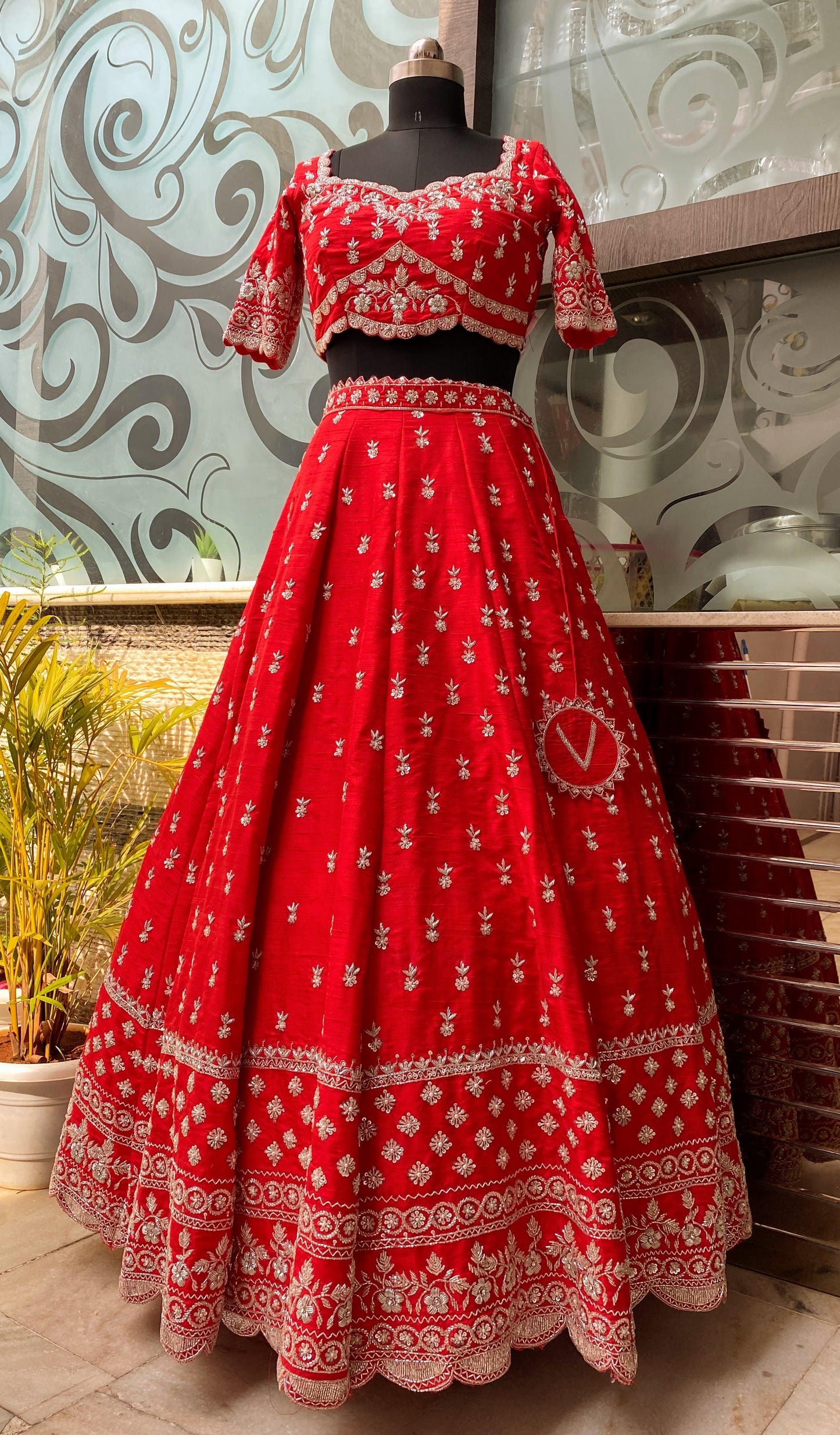 Red bridal lehenga with a silk dupatta - Nishi Madaan Label