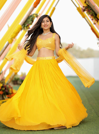 A yellow lehenga set - Nishi Madaan Label