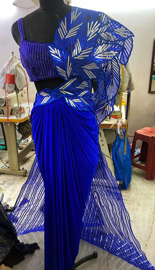 An electric blue dramatic saree - Nishi Madaan Label