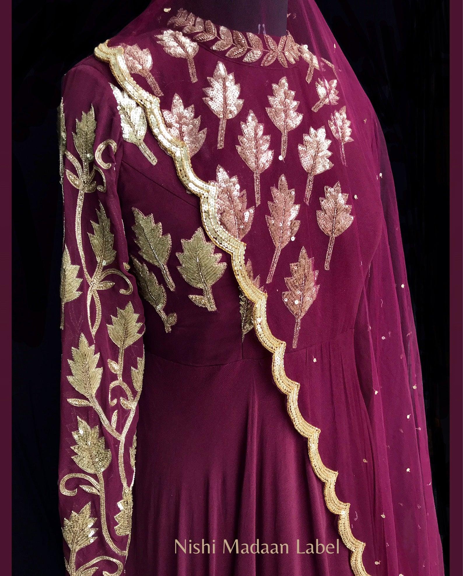 Maroon asymmetrical anarkali gown Nishi Madaan Label Maroon asymmetrical anarkali gown Nishi Madaan Label