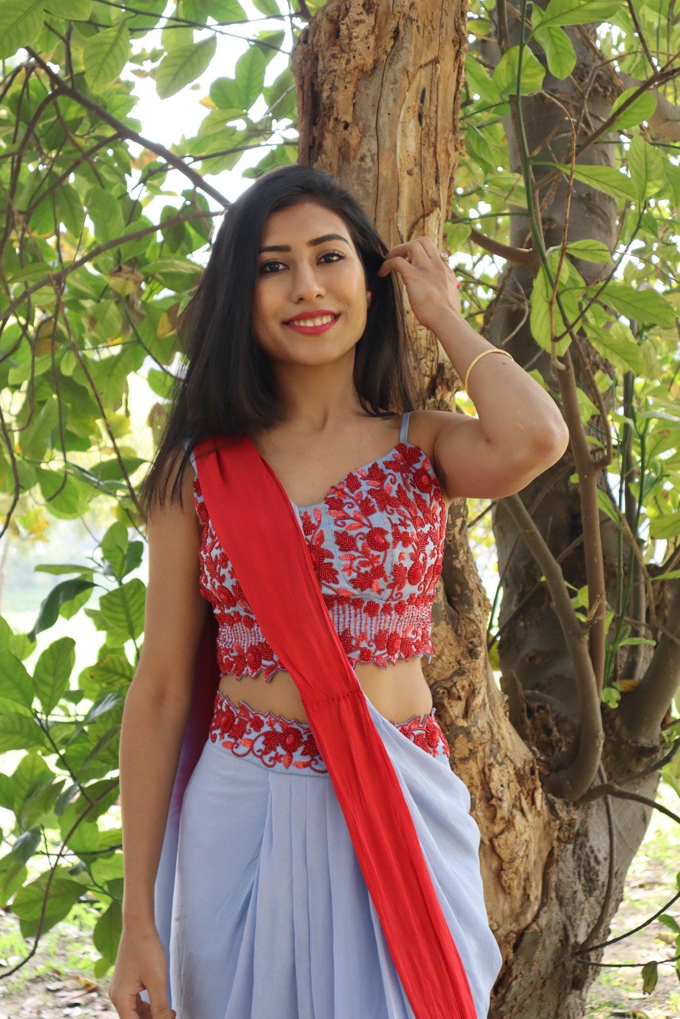 Powder blue and red draped saree skirt with blouse