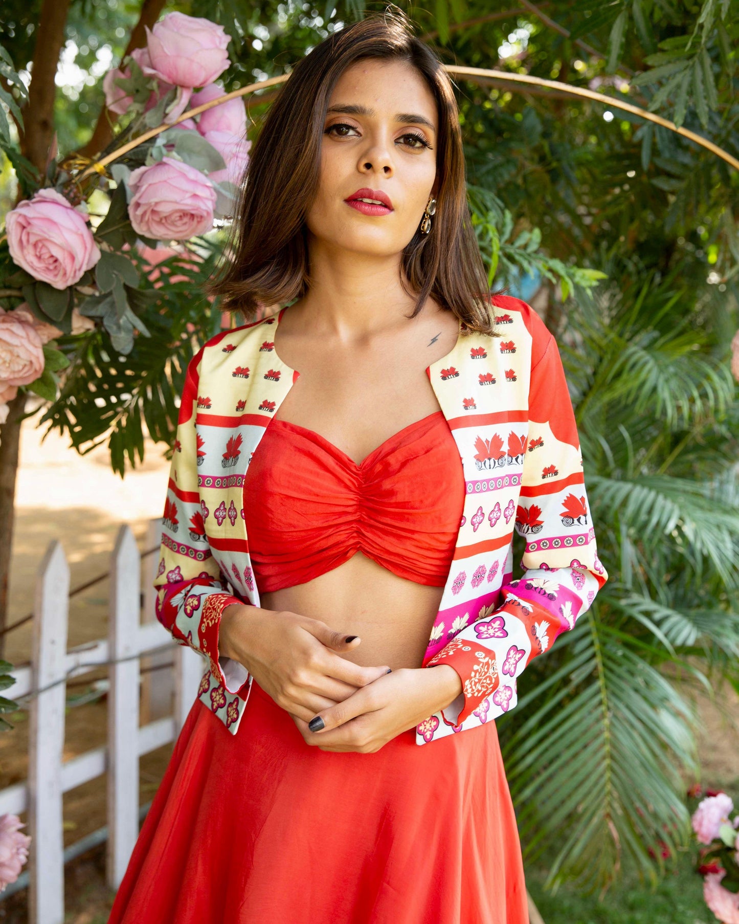 The 'summer breeze' red lehenga set with a printed jacket - Nishi Madaan Label